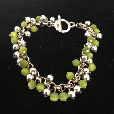 Silver tone and green beaded bracelet