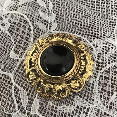 Vintage black plastic brooch