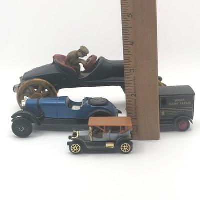 LOT 28L: Reproduction Cast Iron Boat Tail Race Car, Blue Mercedes Benz Model, Lledo 1995 Wawa Dairy Farms Delivery Truck & More