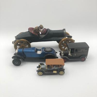 LOT 28L: Reproduction Cast Iron Boat Tail Race Car, Blue Mercedes Benz Model, Lledo 1995 Wawa Dairy Farms Delivery Truck & More