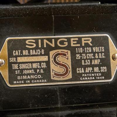 Singer Sewing Machine in Cabinet Table
