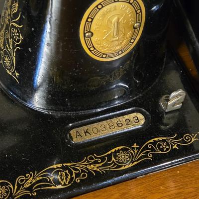 Singer Sewing Machine in Cabinet Table
