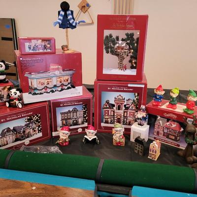 CHRISTMAS VILLAGE BUILDINGS AND 0THER DECORATIONS