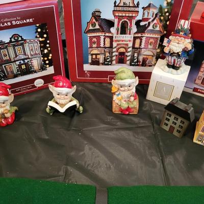 CHRISTMAS VILLAGE BUILDINGS AND 0THER DECORATIONS