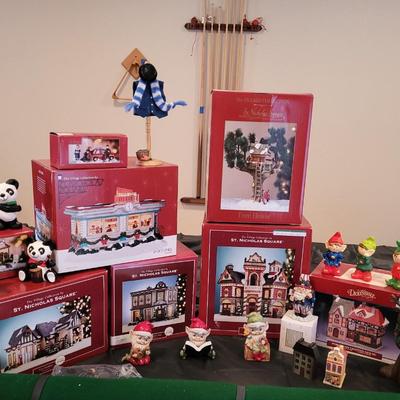 CHRISTMAS VILLAGE BUILDINGS AND 0THER DECORATIONS