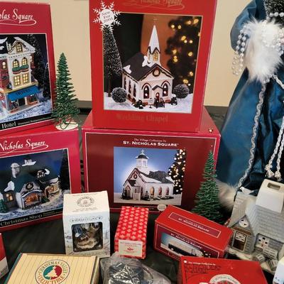 CHRISTMAS VILLAGE BUILDINGS, SANTAS AND ACCESSORIES