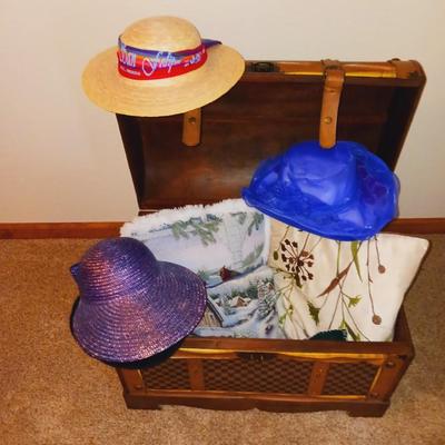 DECORATIVE CHEST FILLED W/LADIES HATS AND THROW PILLOWA