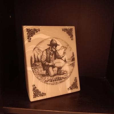 OVER THE TOILET SHELF, BATHROOM ITEMS AND ALASKA ART