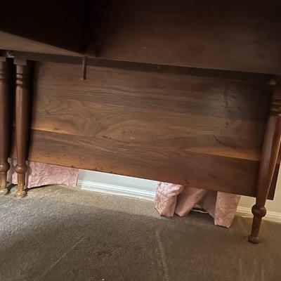 Vintage Wooden Drop Leaf Table 64" Long, 46" Wide, & 28.5" Tall in Good Preowned Condition.