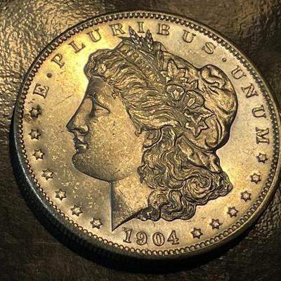 1904-O BU CONDITION PROOF LIKE MORGAN SILVER DOLLAR AS PICTURED.