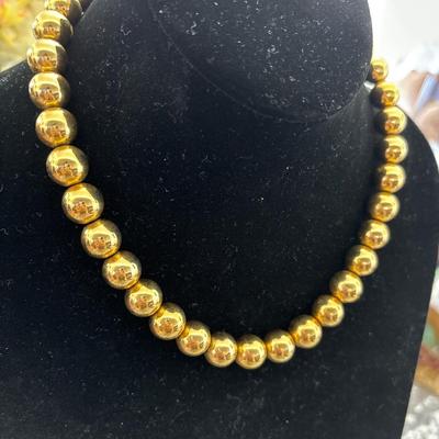 Vintage LCI Liz Claiborne gold toned beaded necklace signed