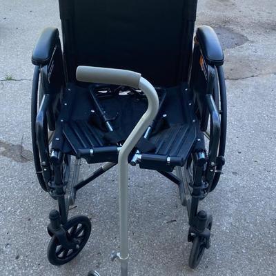 Everest and Jennings Wheelchair and a Cane