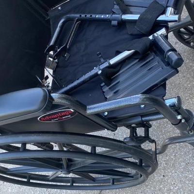 Everest and Jennings Wheelchair and a Cane