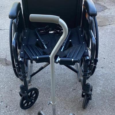 Everest and Jennings Wheelchair and a Cane