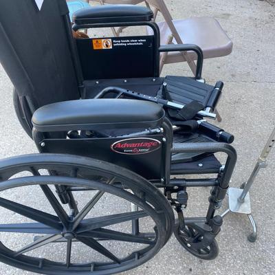 Everest and Jennings Wheelchair and a Cane