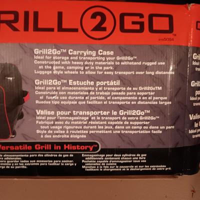 LIKE NEW THERMOS GRILL TO GO PLUS SEVERAL COOLERS AND A FOLDING CHAIR