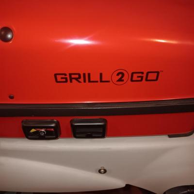 LIKE NEW THERMOS GRILL TO GO PLUS SEVERAL COOLERS AND A FOLDING CHAIR
