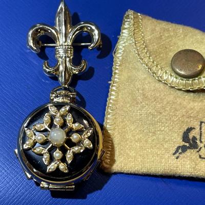 Vintage CORO Pegasus Gold-tone Seed Pearl Family Album Double Locket Brooch in Very Good Preowned Condition.