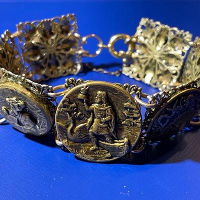 Vintage/Antique German Brass 7" Figural Bracelet in Good Preowned Condition.