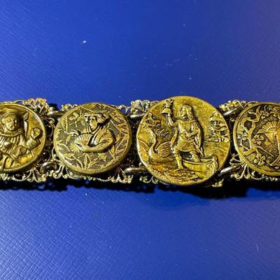 Vintage/Antique German Brass 7" Figural Bracelet in Good Preowned Condition.