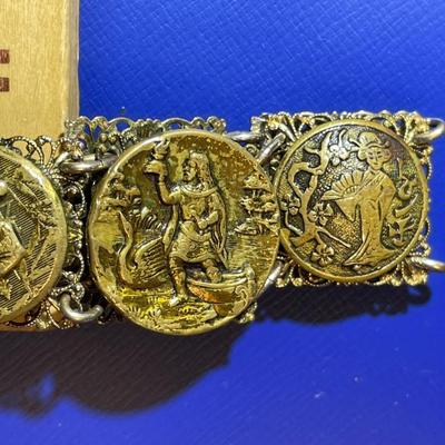 Vintage/Antique German Brass 7" Figural Bracelet in Good Preowned Condition.