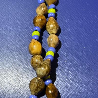 Vintage Nut Bead 34" Necklace in Very Good Preowned Condition as Pictured.