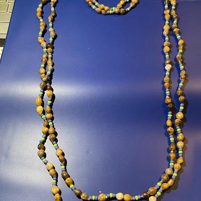 Vintage Nut Bead 34" Necklace in Very Good Preowned Condition as Pictured.