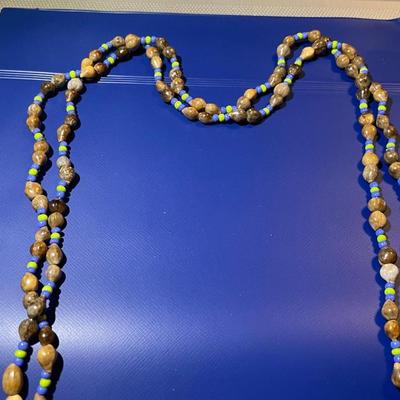 Vintage Nut Bead 34" Necklace in Very Good Preowned Condition as Pictured.