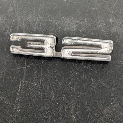 Mercury Plate, Vintage Stereo Knobs, and Emblems