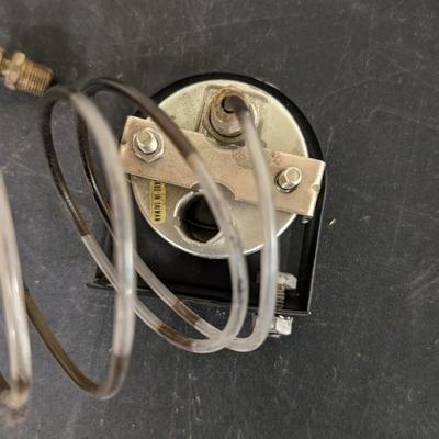Ford Model A Oval Speedometer, Deluxe Clock, and Varied Gauges