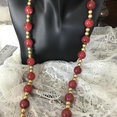 Red and gold tone beaded necklace