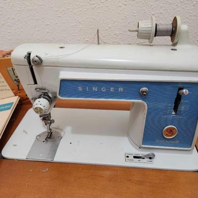 Vintage 1960's Singer Sewing Machine 604e with a maple cabinet/ accessories
