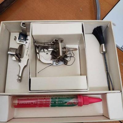 Vintage 1960's Singer Sewing Machine 604e with a maple cabinet/ accessories
