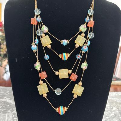 Multi layered plastic bead And glass bead necklace