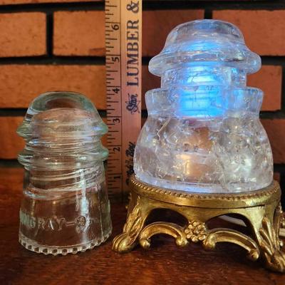 Glass phone line insulator that had been turned into a light plus small insulator