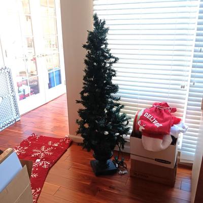 LITE EVERGREEN TREE IN A POT, 3 THROW RUGS, ORNAMENTS, STOCKING STUFFERS, ETC