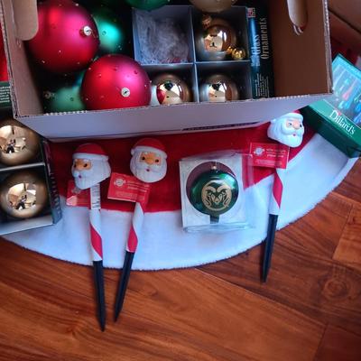 LITE EVERGREEN TREE IN A POT, 3 THROW RUGS, ORNAMENTS, STOCKING STUFFERS, ETC