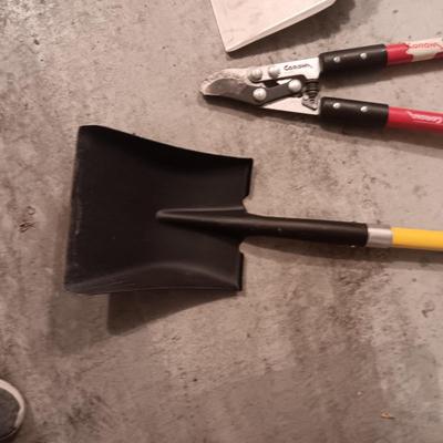 SHOVELS, LOPERS AND A LARGE METAL DUST PAN
