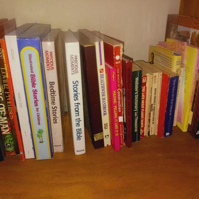AN ASSORTMENT OF BOOKS