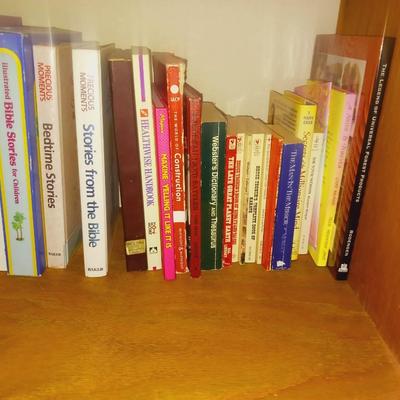 AN ASSORTMENT OF BOOKS
