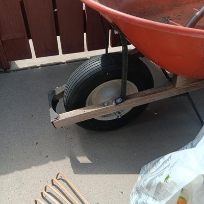 WHEELBARROW, HIS AND HERS LEAF RAKES, TURF BUILDER & SHOVEL