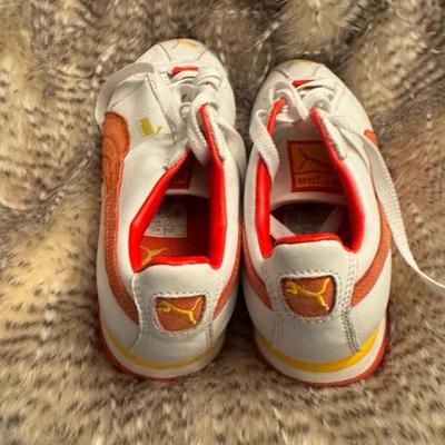 Puma orange and white size 6