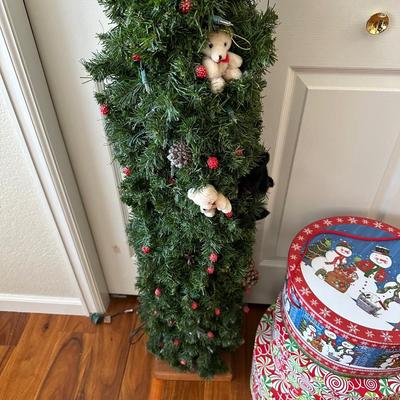 LIGHTED CHRISTMAS TREE AND CHRISTMAS THEMED STORAGE BOXES