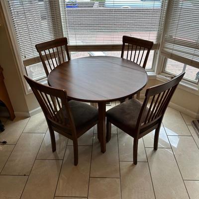 ROUND DRUM DROP LEAF TABLE WITH 4 SEAT CUSHIONED CHAIRS