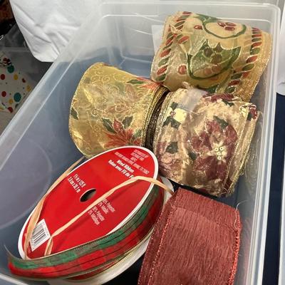 Two totes of ribbon