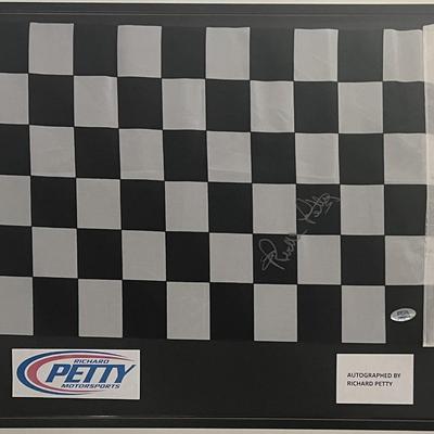 Richard Petty signed checkered flag. PSA authenticated