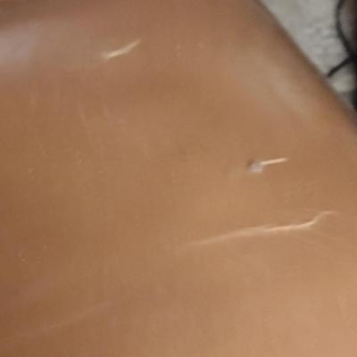 Wood Framed, Faux Leather Covered Chair with Brass Tack Accents