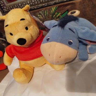 Winnie the Pooh and Eeyore stuffed animals