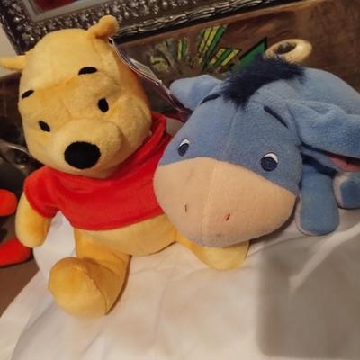 Winnie the Pooh and Eeyore stuffed animals