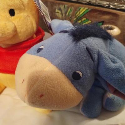 Winnie the Pooh and Eeyore stuffed animals